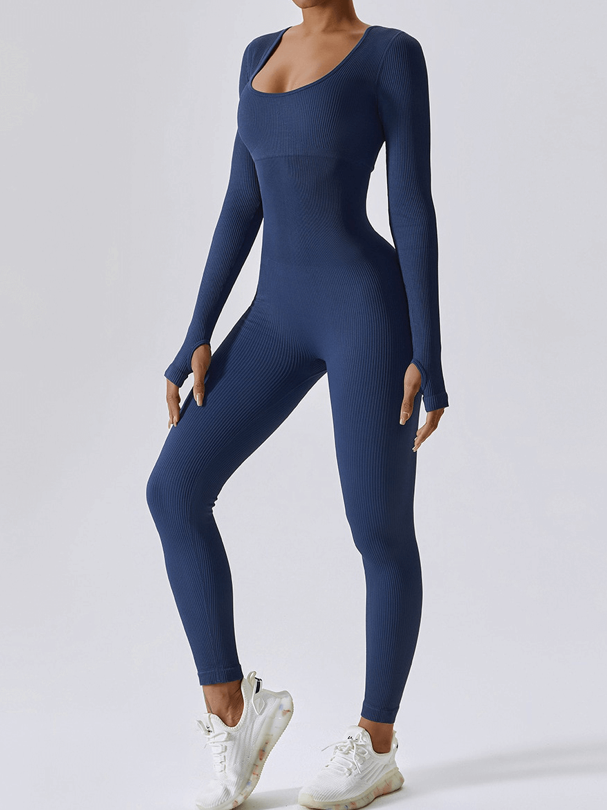 Seamless blue yoga suit with thumb holes on sleeves for women's fitness, offering a flattering fit and stretchable fabric.